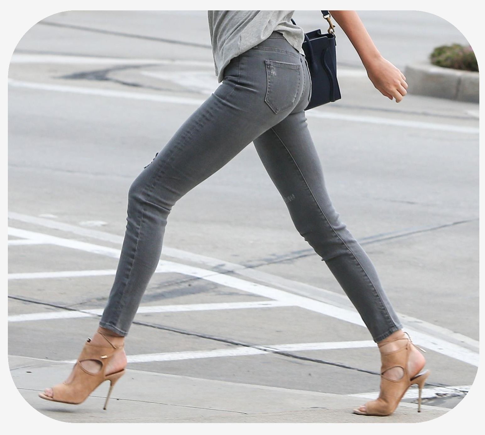 Female with a long stride walking in heels