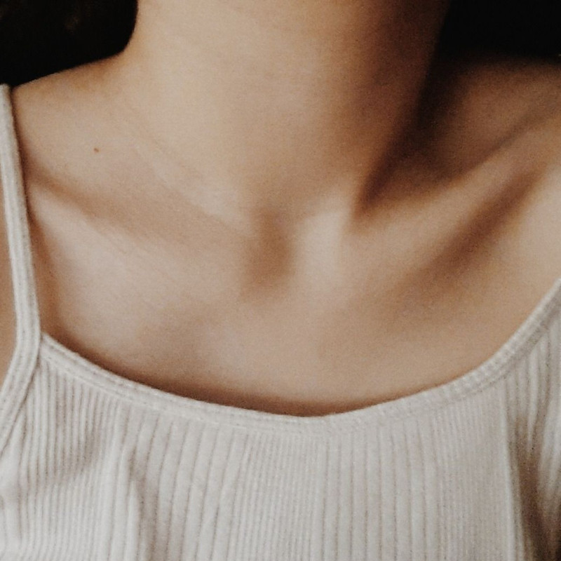 Front view of woman neck highlighting visable collarbones.