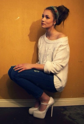Woman crouched pose looking up