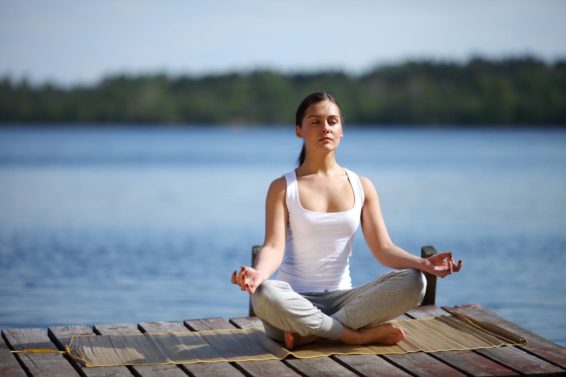 Woman meditating to a verbal chant